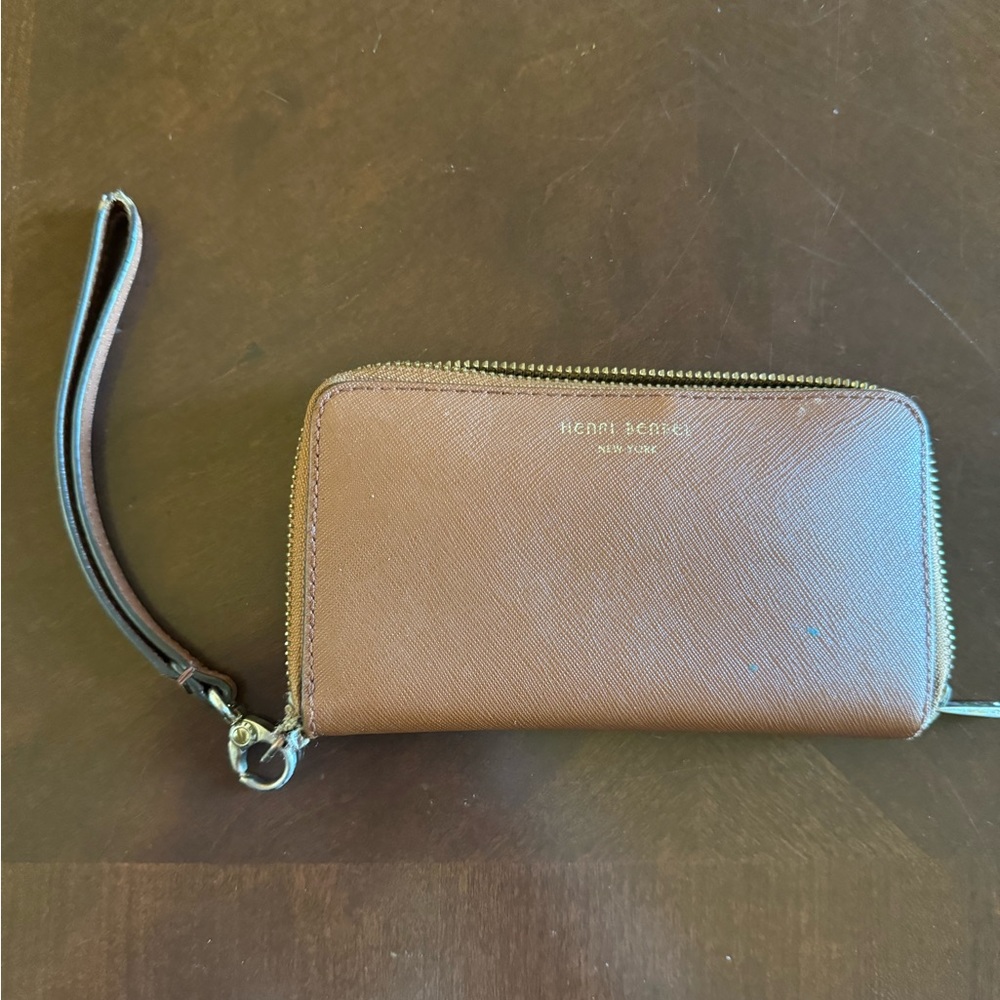 Henri Bendel Wristlet Wallet good condition slightly torn on the side